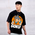 Person wearing a black t-shirt with a graphic of Goku from Dragon Ball Z