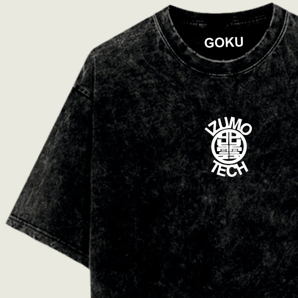 Black t-shirt with 'IZUMO TECH' logo and 'GOKU' text on a light green background