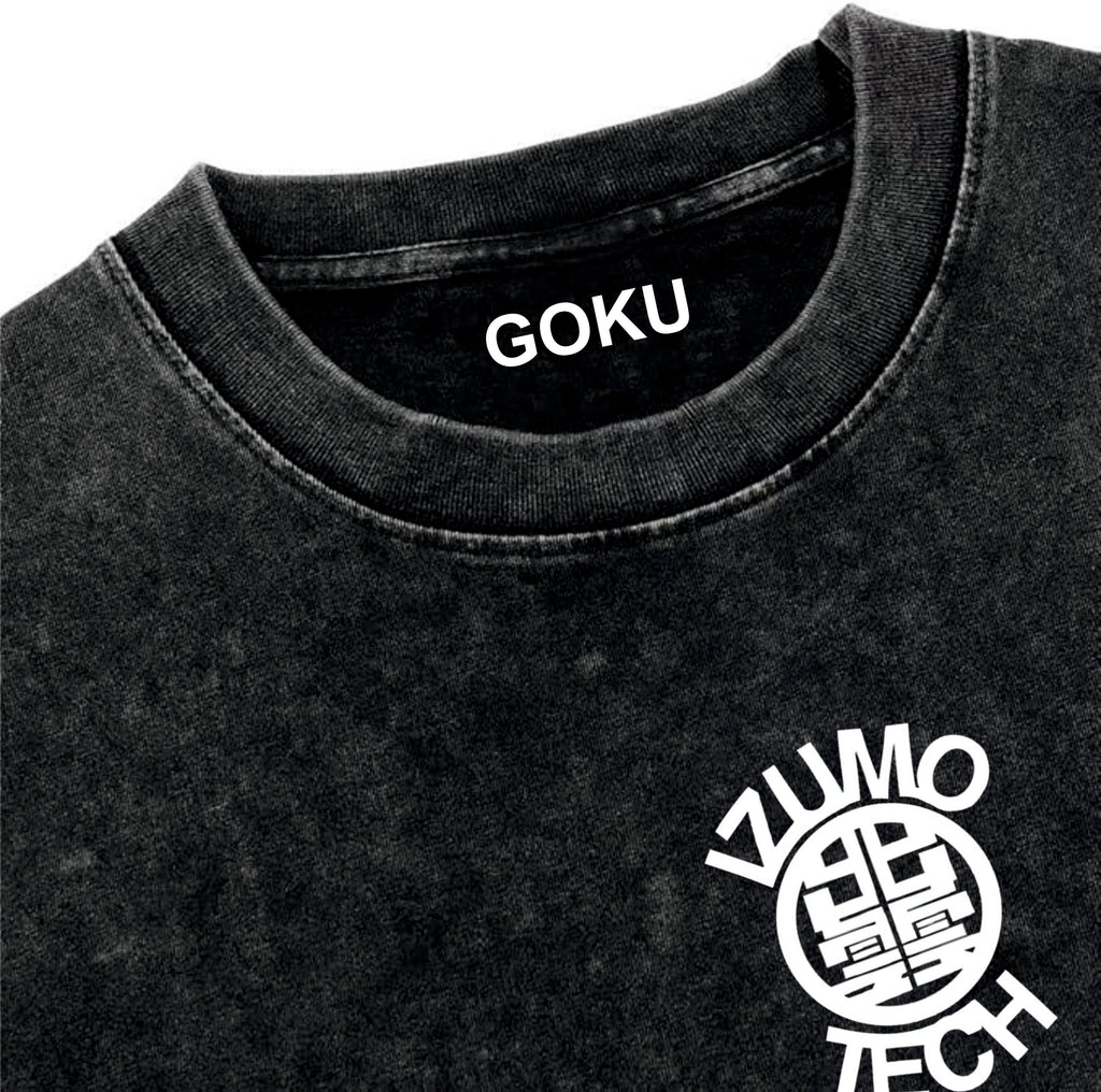 Black t-shirt with 'GOKU' printed on the collar and 'IZUMO' logo on the sleeve.