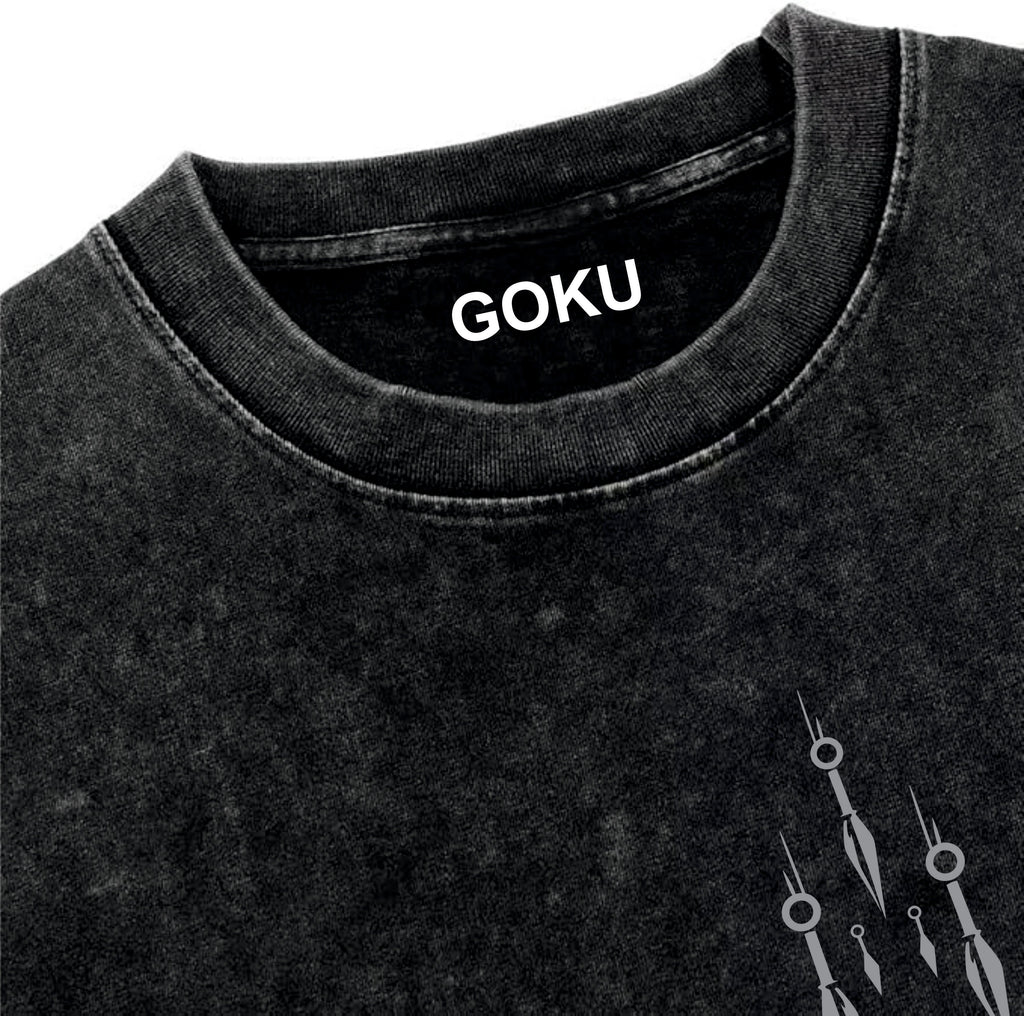 Black t-shirt with 'GOKU' printed on the collar against a white background