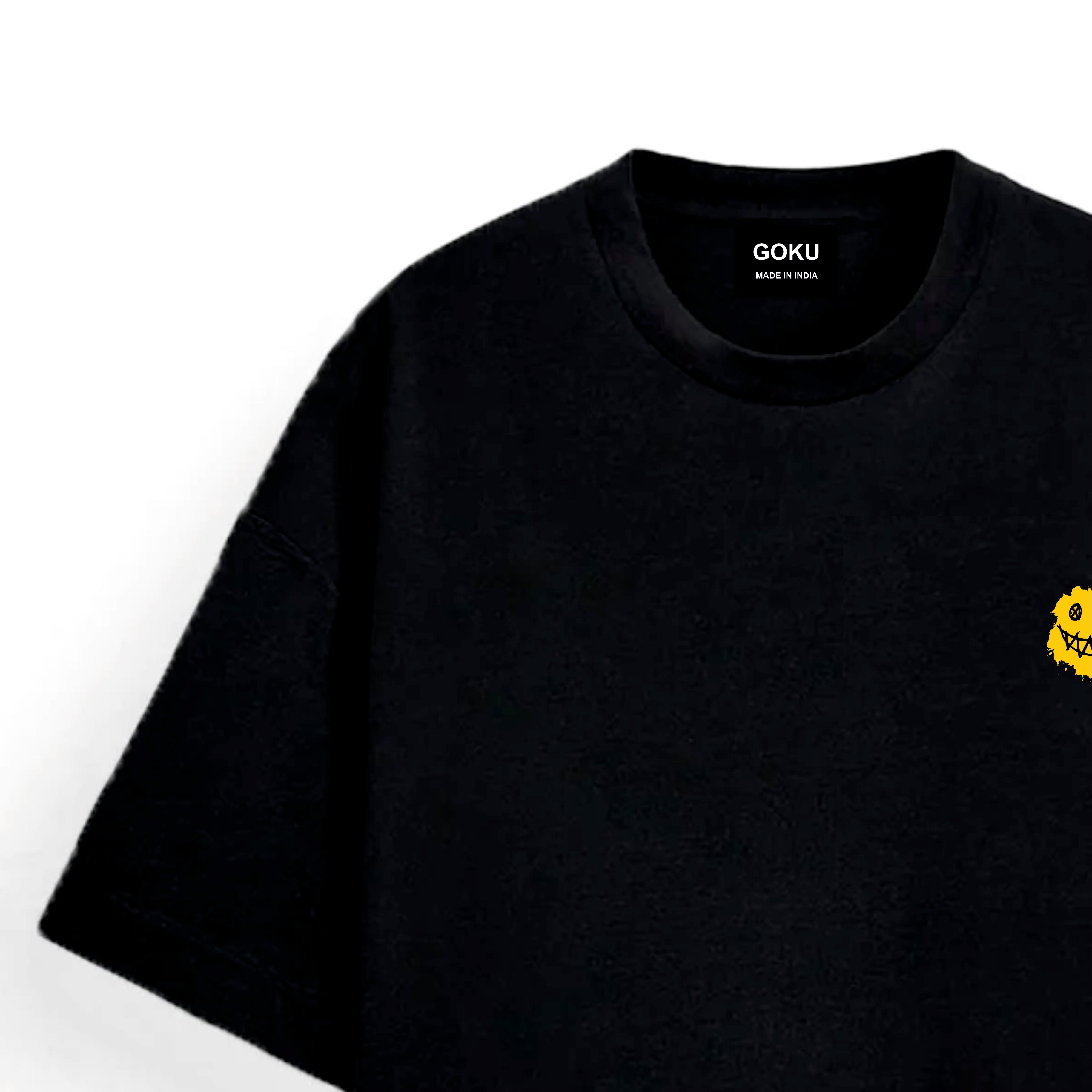 Black t-shirt with a small yellow character on the chest