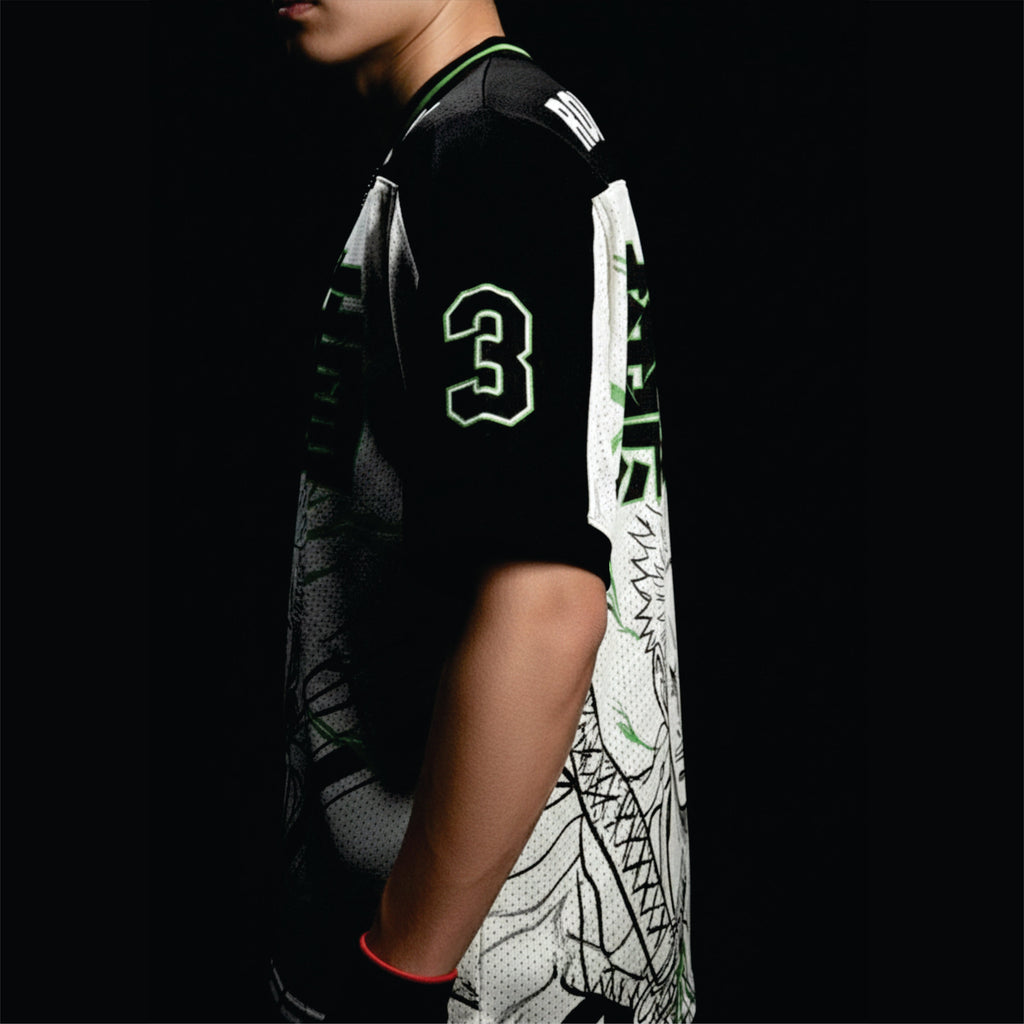 Person wearing a sports jersey with number 3 on a dark background
