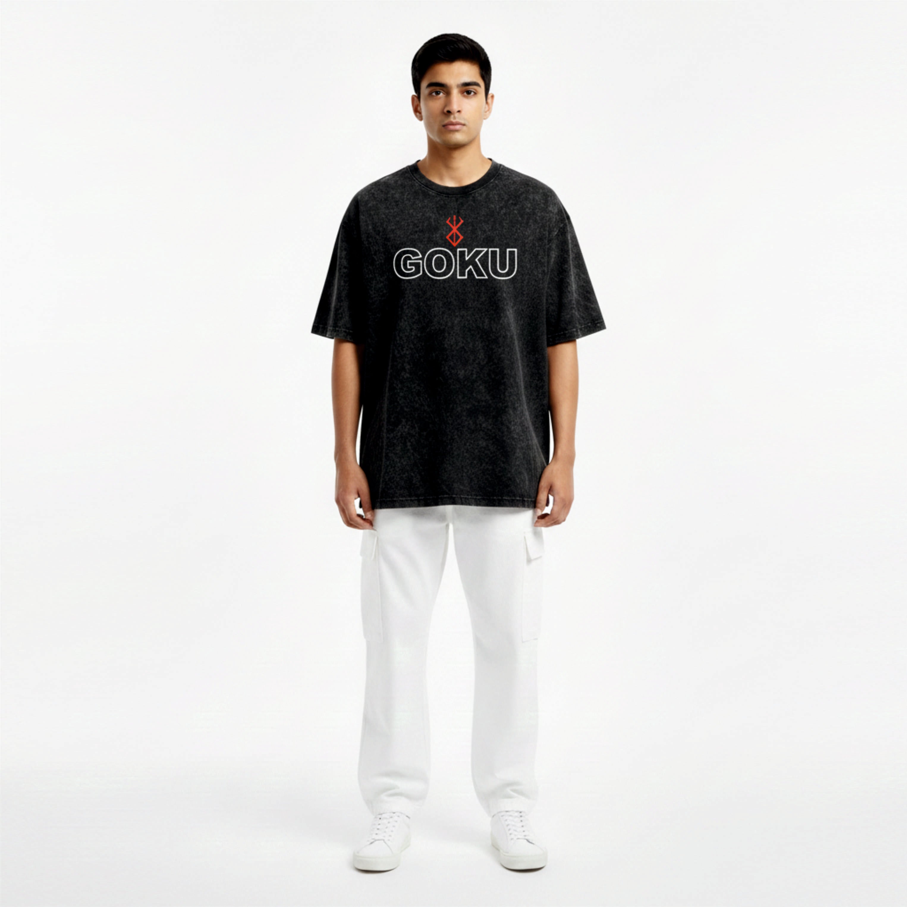 Person wearing a black t-shirt with 'GOKU' printed on it against a white background