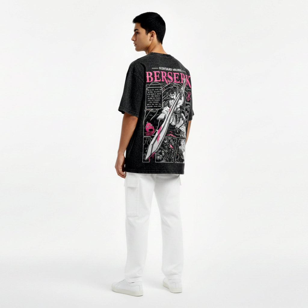 Person wearing a black t-shirt with graphic design and text on the back, standing against a white background