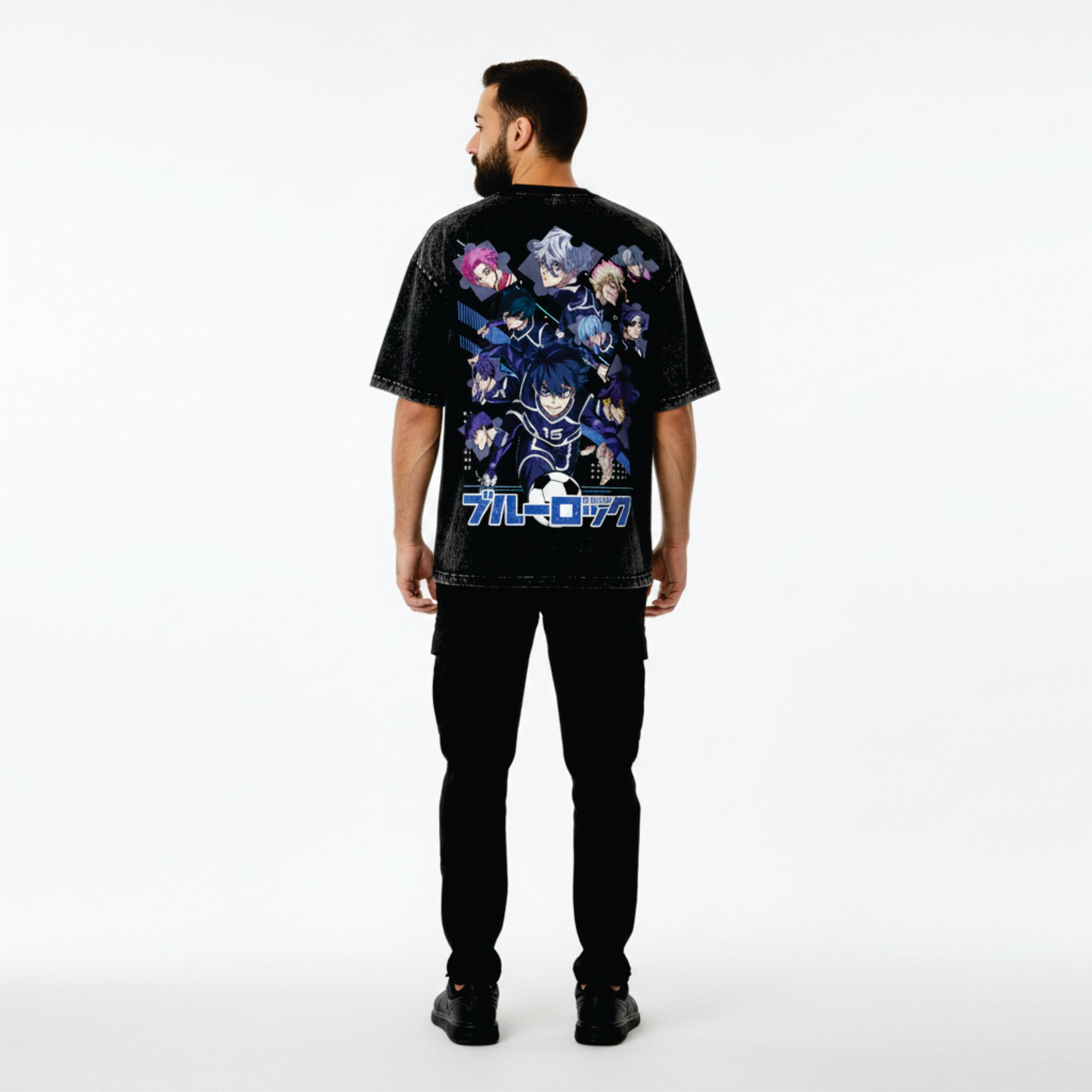 Person wearing a black t-shirt with colorful graphics on the back against a white background