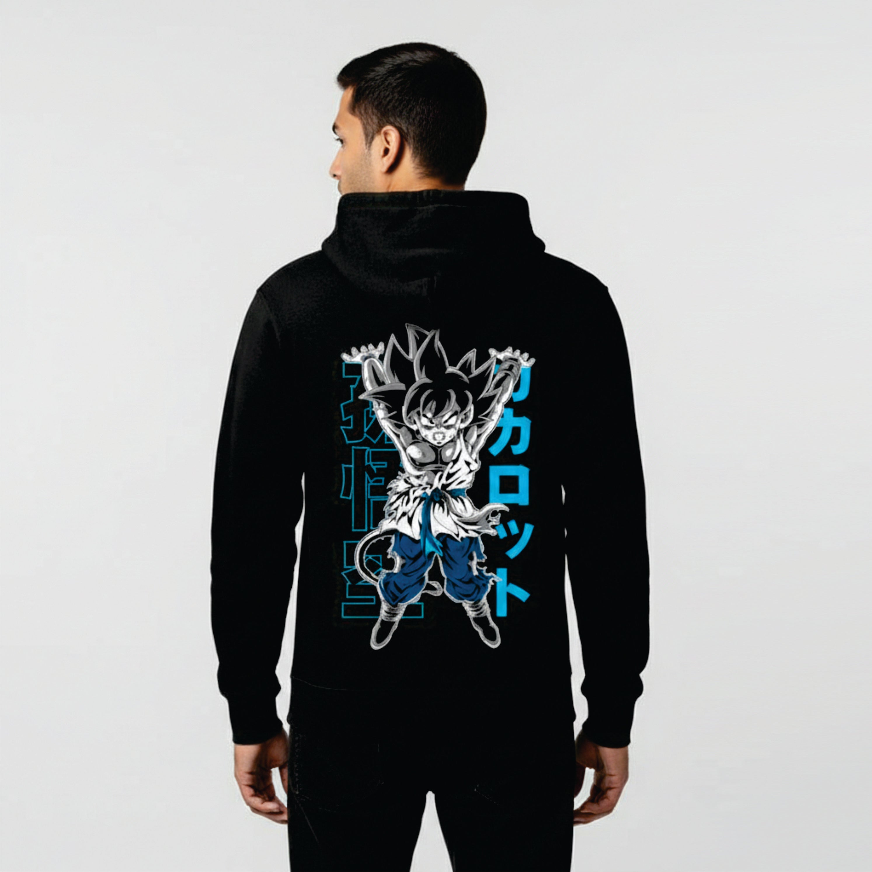 Person wearing a black hoodie with a graphic design on the back against a white background