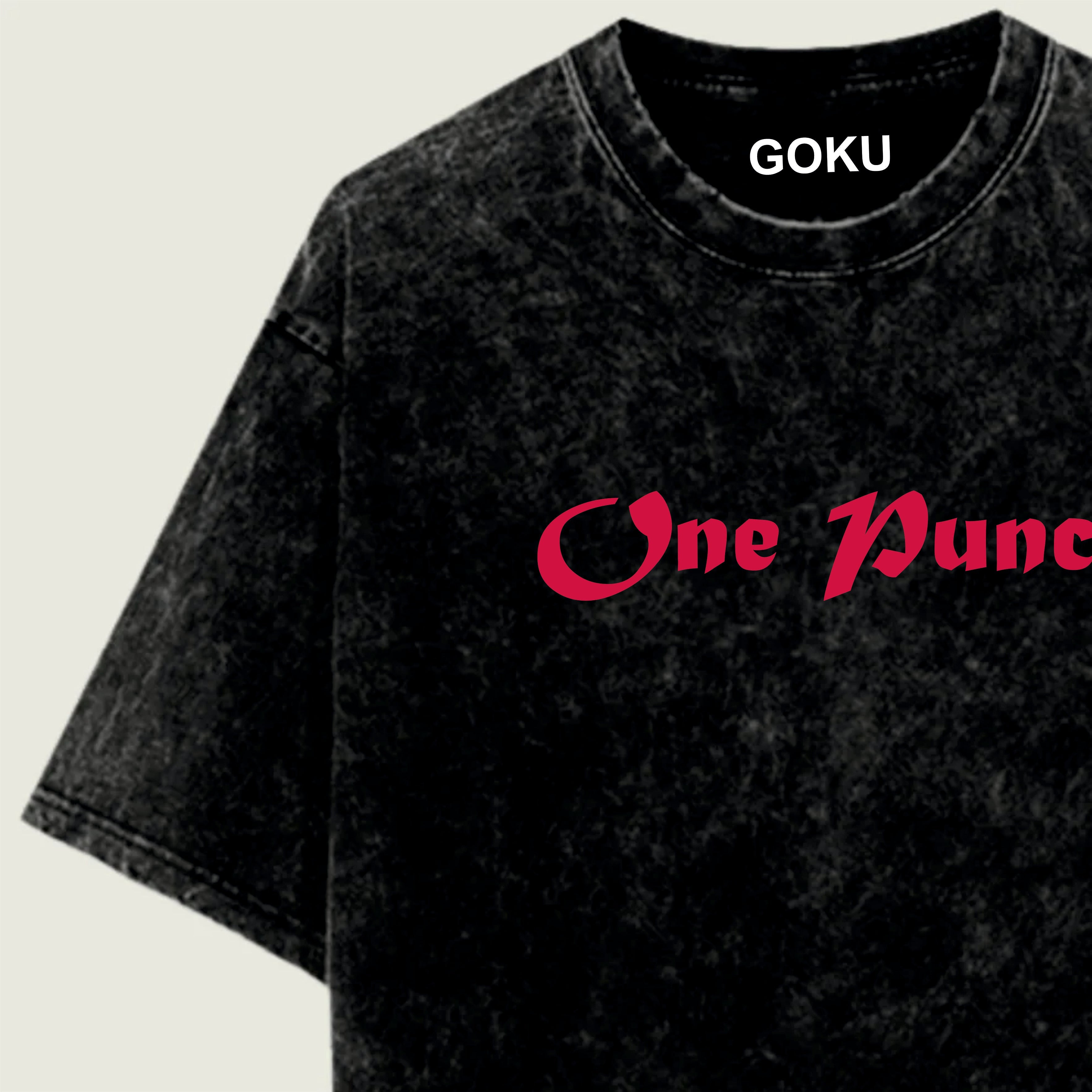 Black t-shirt with 'GOKU' and 'One Punch' text on a light beige background