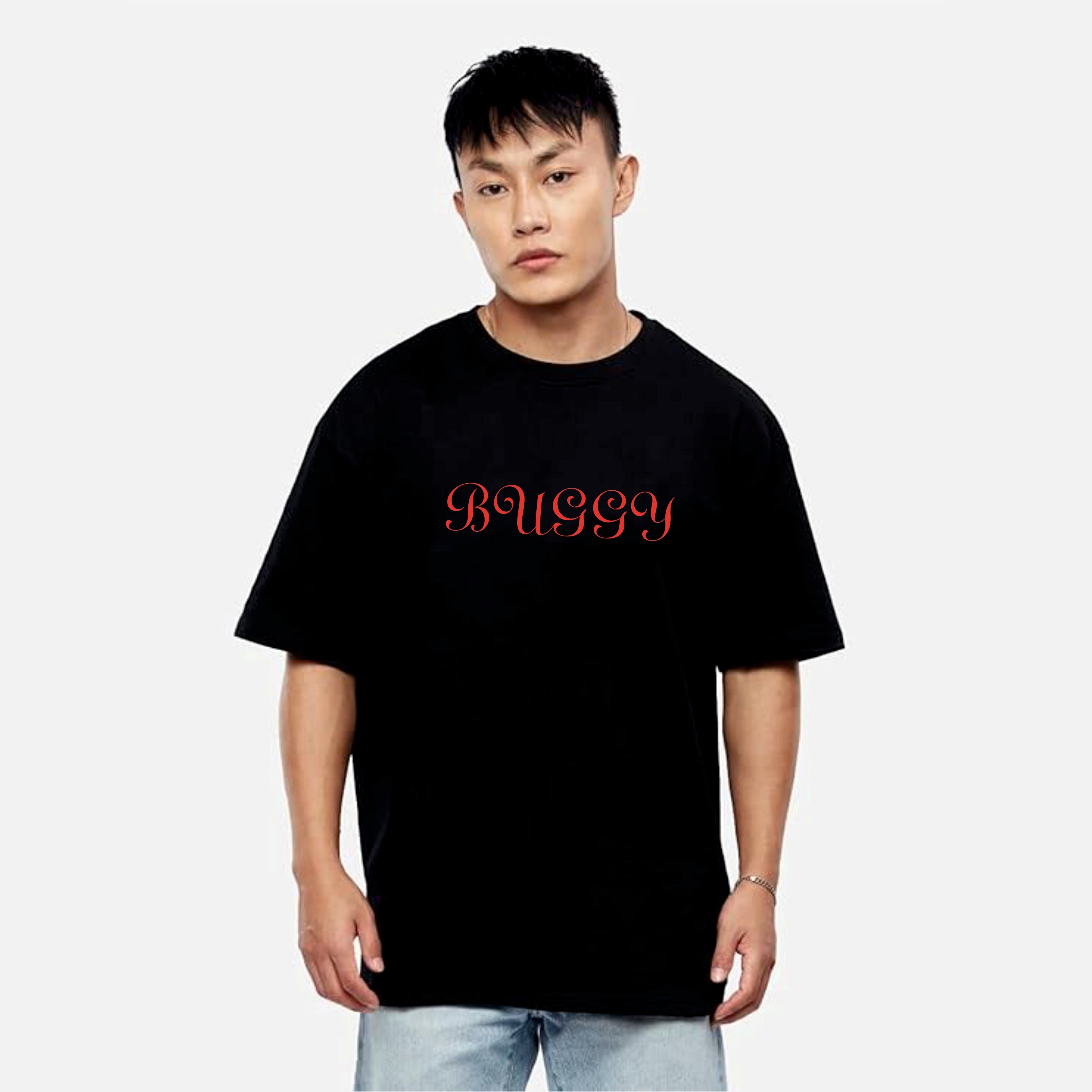 Person wearing a black t-shirt with 'BUGGY' printed in red